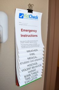 KidCheck Secure Check-In shares a Free Download: Emergency Instructions Flip Book